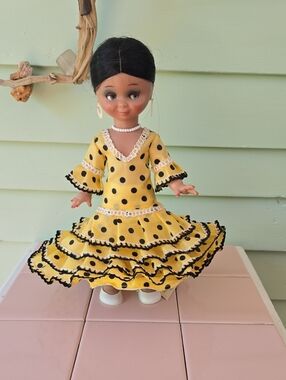Vintage Spanish flamenco dancer doll in yellow polka dot dress